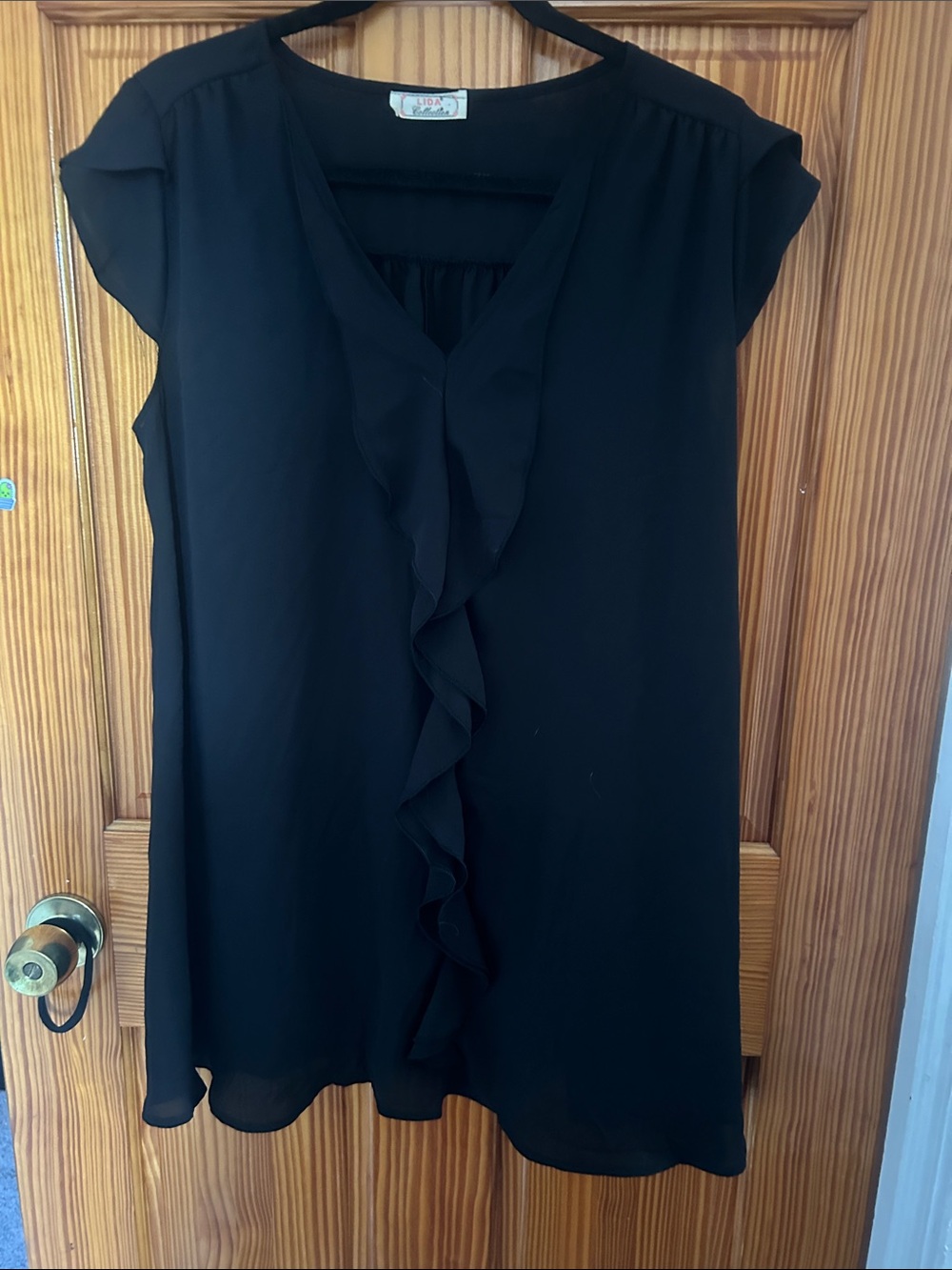 Dalia Collection Black Ruffle-Front Sleeveless Blouse